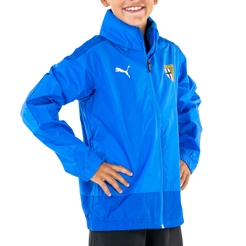 Giubbino antipioggia junior azzurro con zip tasche laterali e cappuccio a scomparsa e logo Parma Calcio