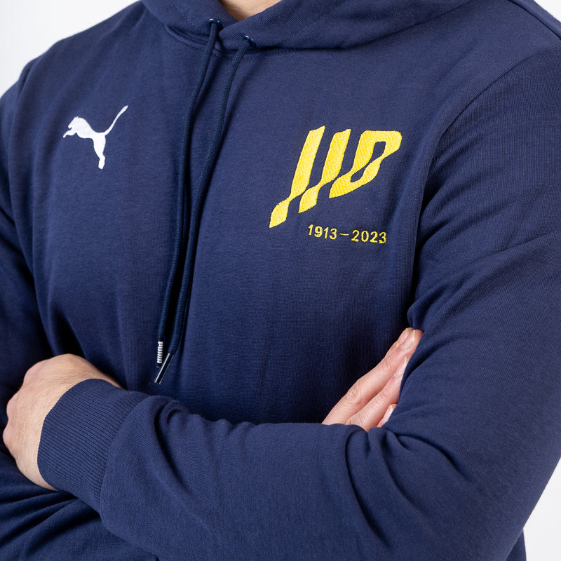 Felpa blu uomo in cotone con cappuccio tasca marsupio logo speciale 110 logo Puma e logo Parma Calcio sulla spalla destra