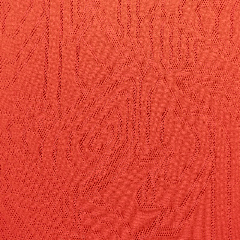 Maglia rossa training mezze maniche con trama geometrica sul fronte e logo Parma Calcio dettaglio texture