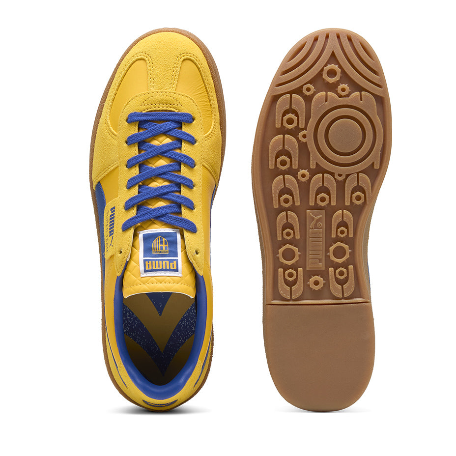 Sneakers puma x parma calcio caratterizzata dal signature tag sulla tomaia in pelle con sovrapposizioni in suede, dalla costruzione T-toe e dalla classica suola gum. Sneakers in colore faster yellow e blu Navy