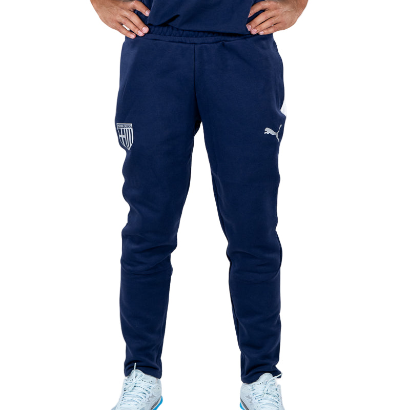 Pantalone tuta lungo blu navy, uomo con elastico in vita, bande laterali bianche, logo Parma Calcio e logo Puma