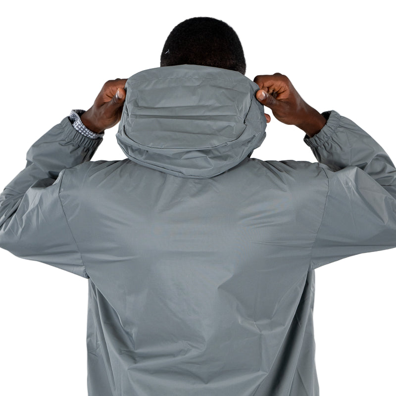 retro giacca antipioggia training grigia con tasche laterali, cappuccio e logo Parma Calcio e Puma