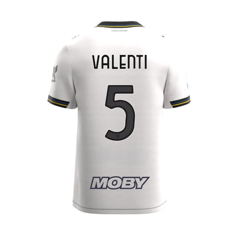 Maglia gara Junior Home Parma Calcio Warm White con croce nera colletto a V, i dettagli in blu e giallo personalizzata con nome e numero Valenti 5, sponsor e patch serie A