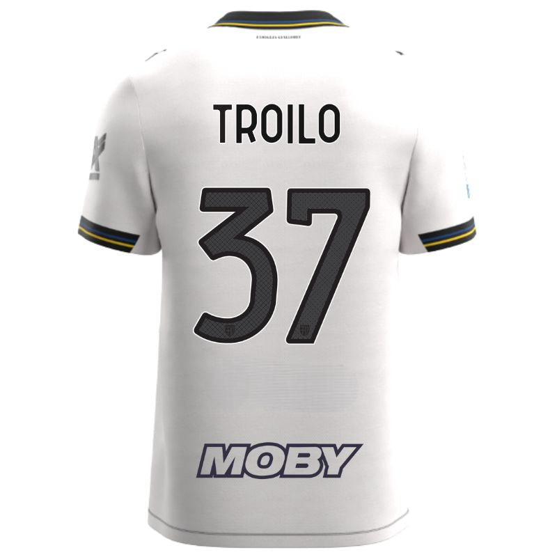 Maglia gara Home Parma Calcio Warm White con croce nera colletto a V, i dettagli in blu e giallo personalizzata con nome e numero Troilo 37, sponsor e patch serie A